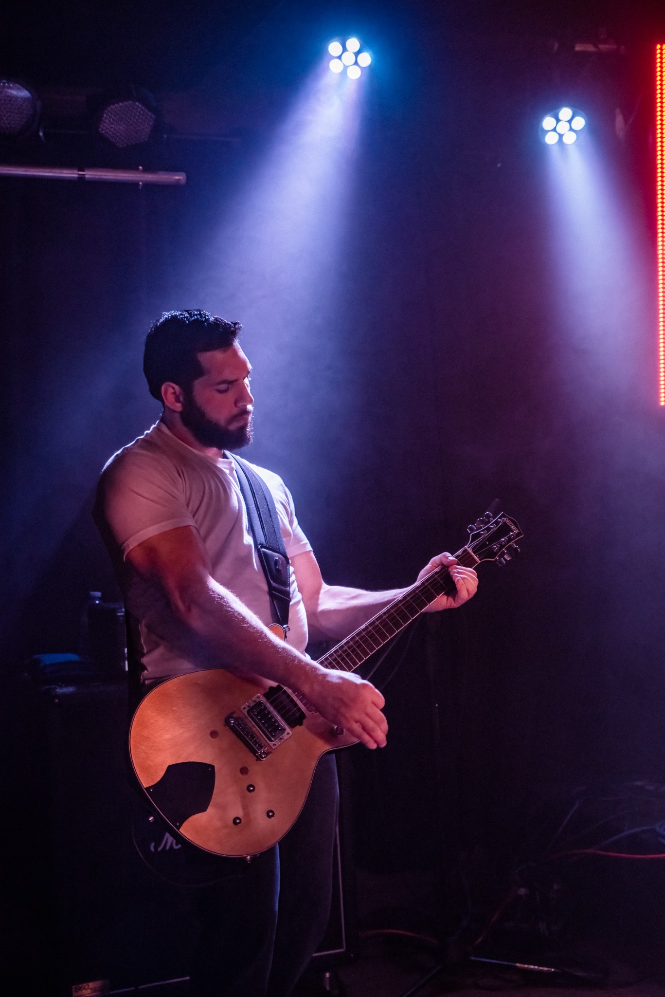Chris Heaton performing on rhythm guitar