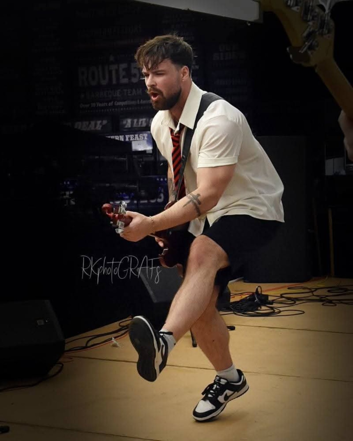 AC/DC ERAS guitarist performing live